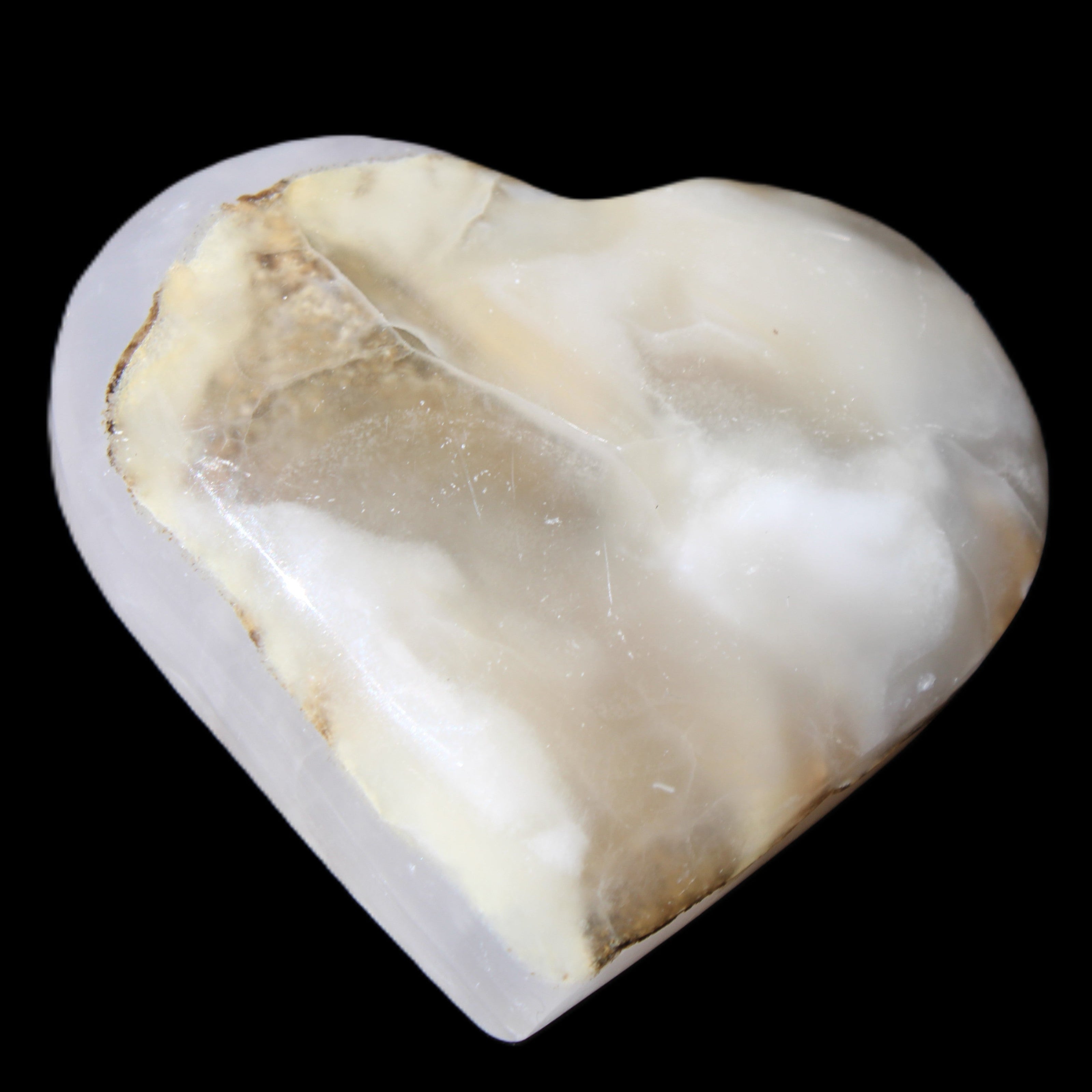 Mangano Calcite hand-carved heart 66/67*64/70mm 130-136g in sunlight - Rocks and Things Store