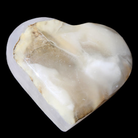 Mangano Calcite hand-carved heart 66/67*64/70mm 130-136g in sunlight - Rocks and Things Store