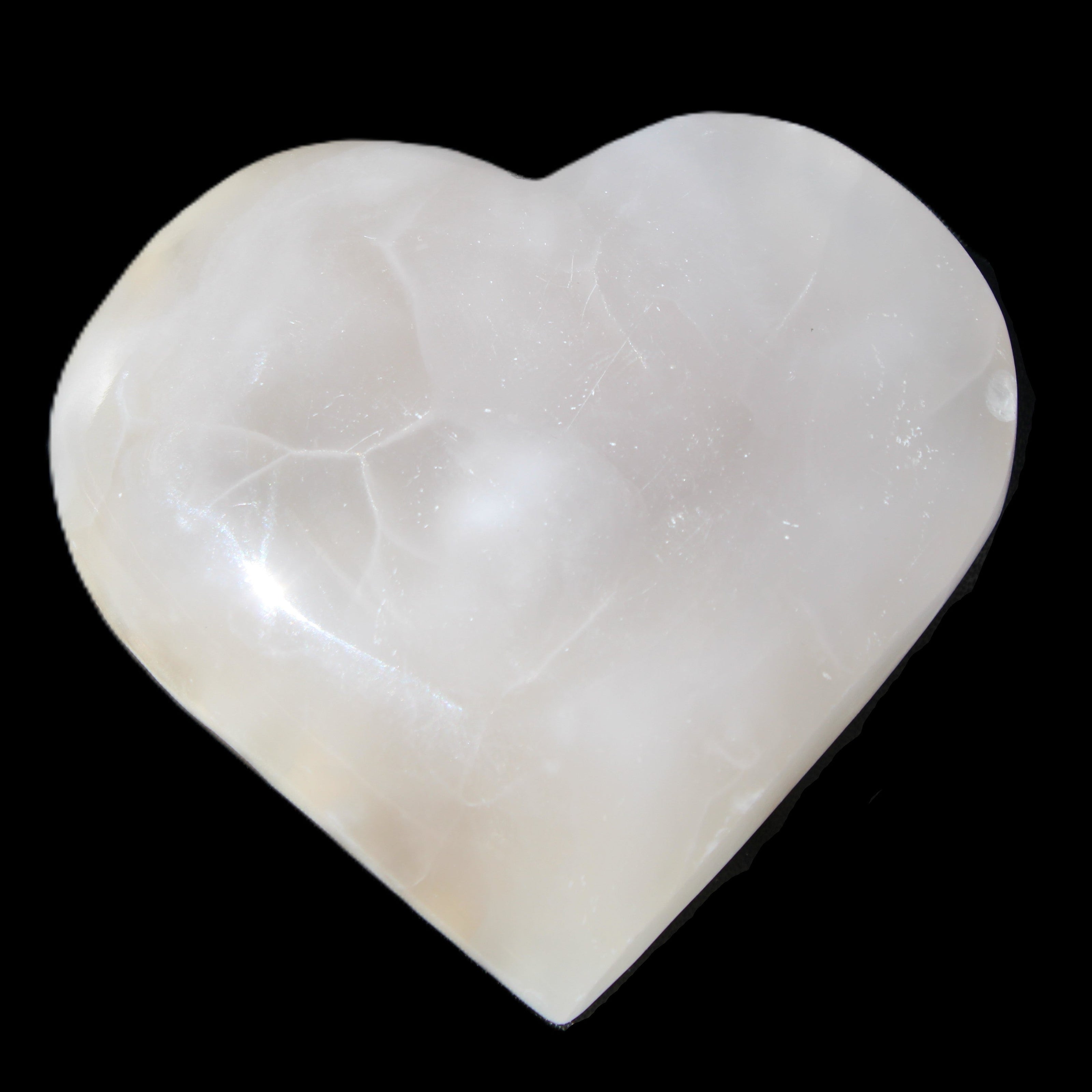 Mangano Calcite hand-carved heart 66/67*64/70mm 130-136g in sunlight - Rocks and Things Store