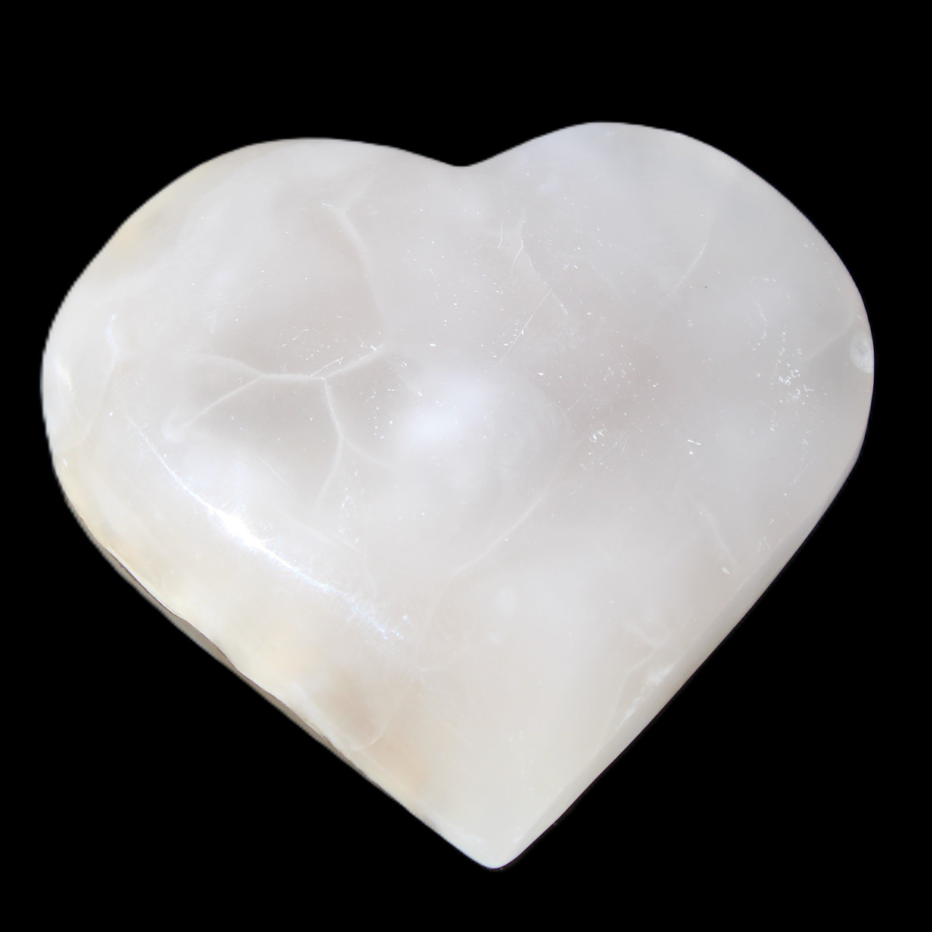 Mangano Calcite hand-carved heart 66/67*64/70mm 130-136g in sunlight - Rocks and Things Store