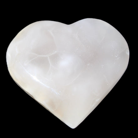 Mangano Calcite hand-carved heart 66/67*64/70mm 130-136g in sunlight - Rocks and Things Store