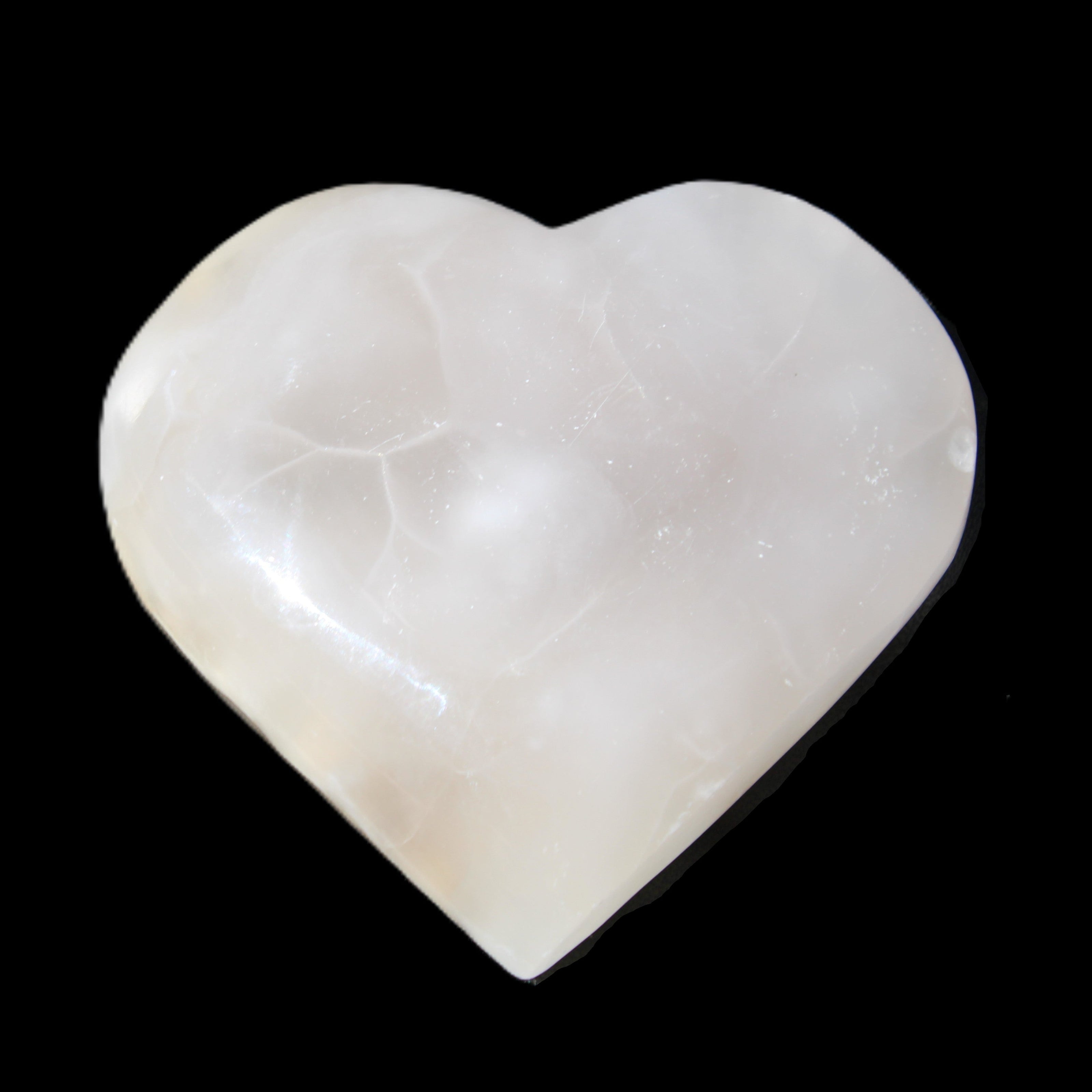 Mangano Calcite hand-carved heart 66/67*64/70mm 130-136g in sunlight - Rocks and Things Store