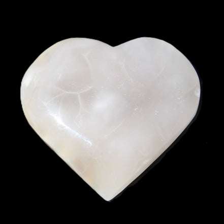 Mangano Calcite hand-carved heart 66/67*64/70mm 130-136g in sunlight - Rocks and Things Store