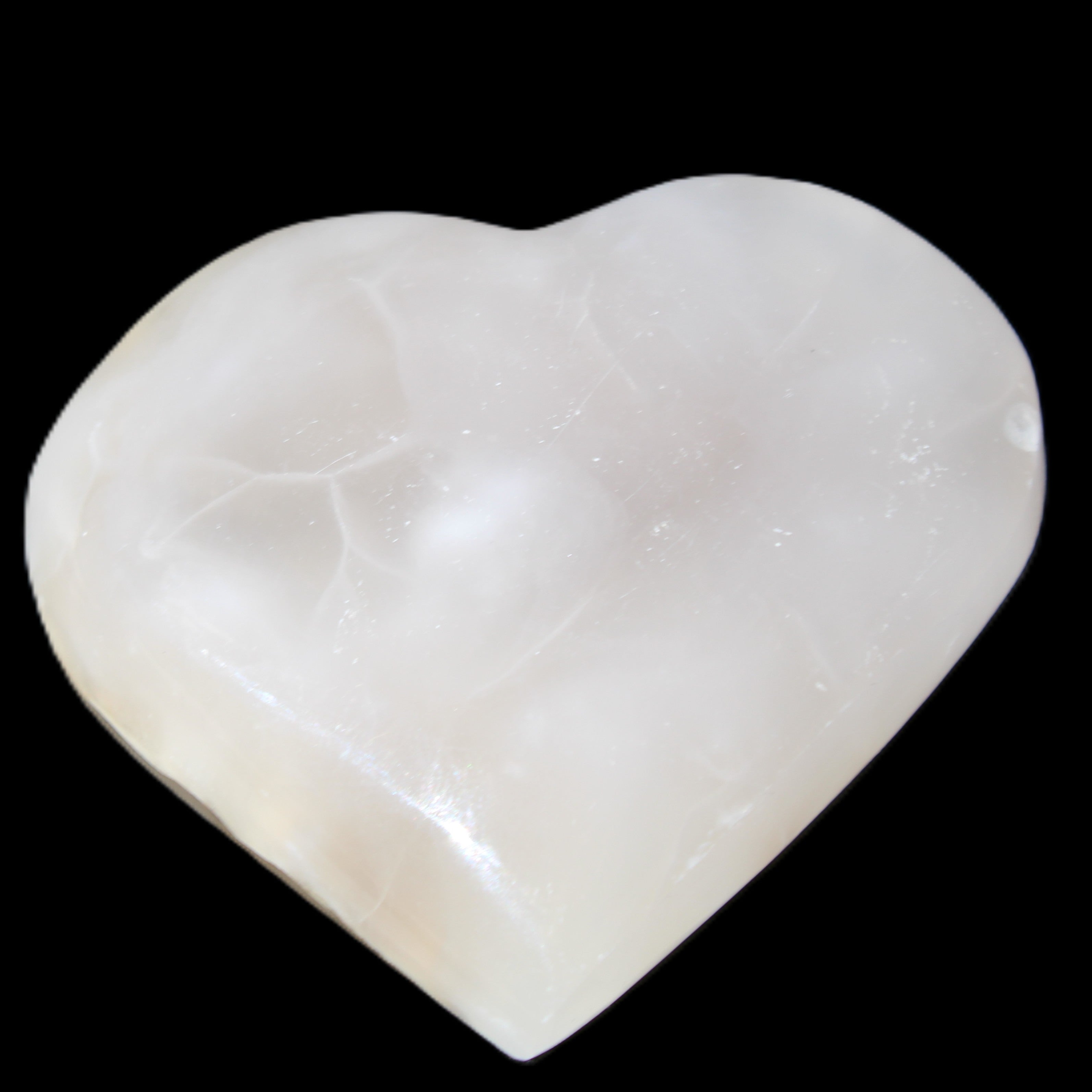 Mangano Calcite hand-carved heart 66/67*64/70mm 130-136g in sunlight - Rocks and Things Store