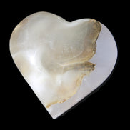 Mangano Calcite hand-carved heart 66/67*64/70mm 130-136g in sunlight - Rocks and Things Store