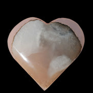 Mangano Calcite hand-carved heart 67-94mm  129-274g in sunlight - Rocks and Things Store