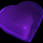 Mangano Calcite hand-carved heart 67-94mm  129-274g in UV light - Rocks and Things Store