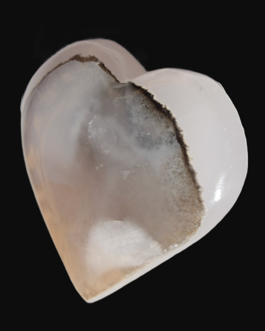 Mangano Calcite hand-carved heart 67-94mm  129-274g in UV light - Rocks and Things Store
