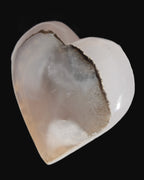 Mangano Calcite hand-carved heart 67-94mm  129-274g in UV light - Rocks and Things Store