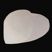 Mangano Calcite hand-carved heart 67-94mm  129-274g in sunlight - Rocks and Things Store