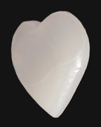 Mangano Calcite hand-carved heart 67-94mm  129-274g in sunlight - Rocks and Things Store