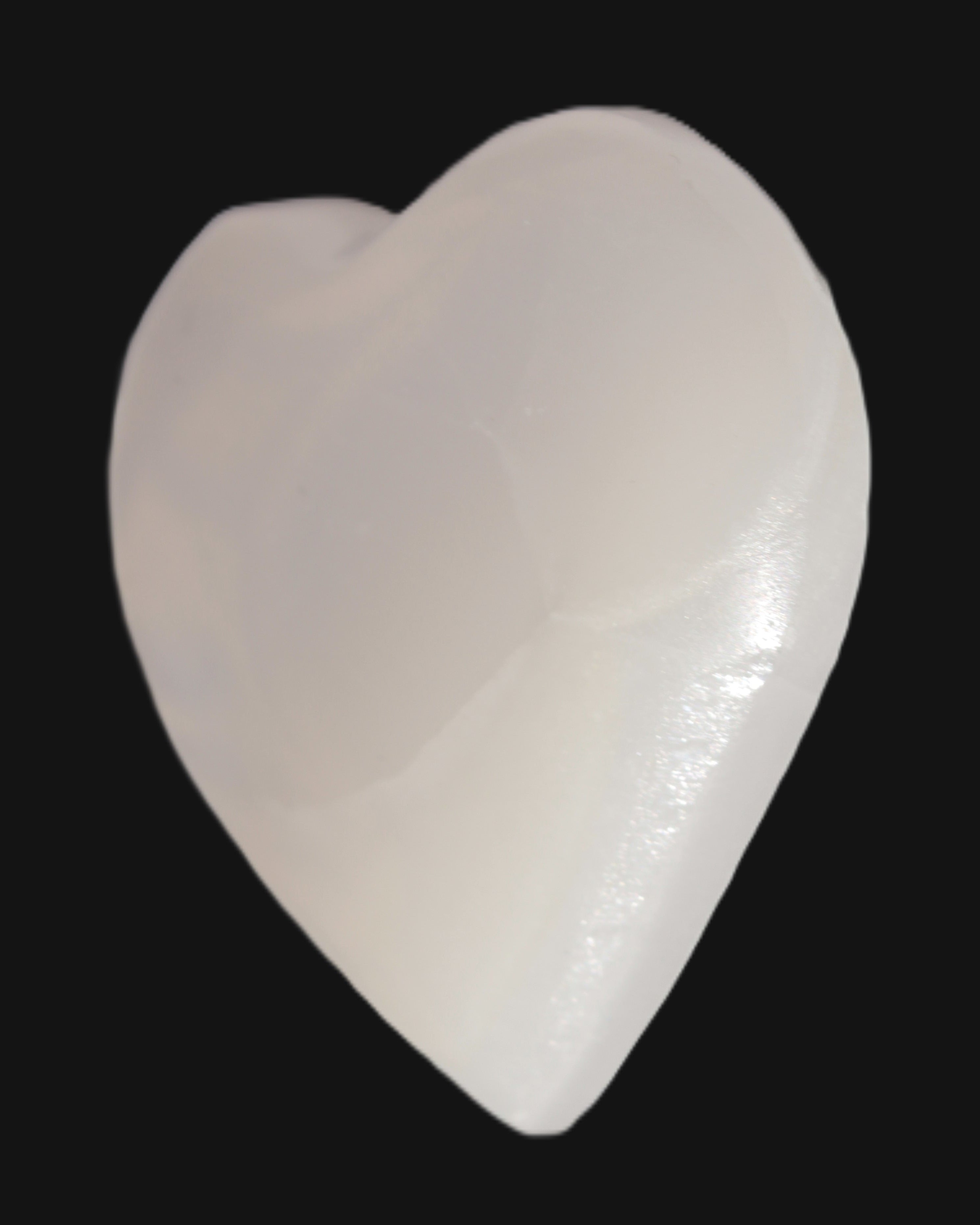 Mangano Calcite hand-carved heart 67-94mm  129-274g in sunlight - Rocks and Things Store