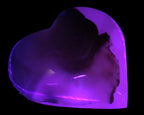 Mangano Calcite hand-carved heart 67-94mm  129-274g in UV light - Rocks and Things Store