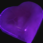 Mangano Calcite hand-carved heart 67-94mm  129-274g in UV light - Rocks and Things Store