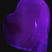 Mangano Calcite hand-carved heart 67-94mm  129-274g in UV light - Rocks and Things Store
