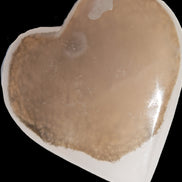 Mangano Calcite hand-carved heart 60-65mm  112-117g in sun light - Rocks and Things Store