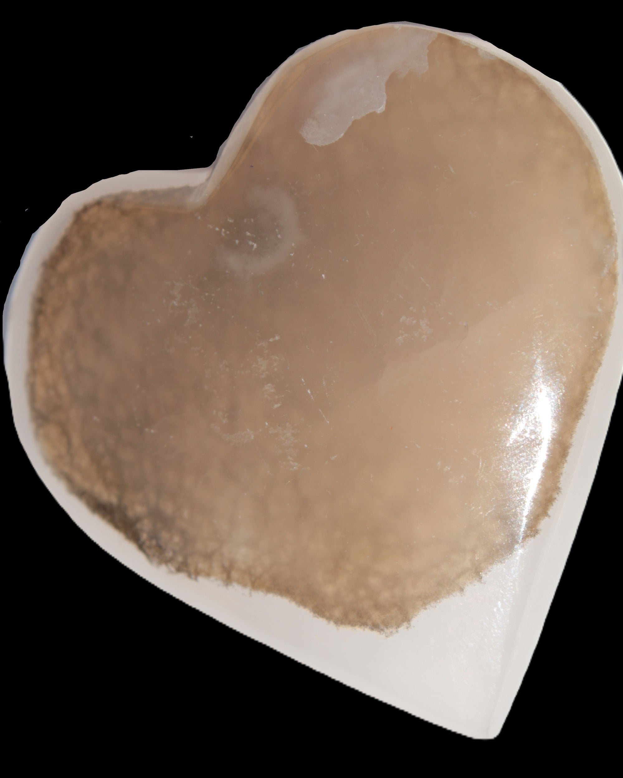 Mangano Calcite hand-carved heart 60-65mm  112-117g in sun light - Rocks and Things Store
