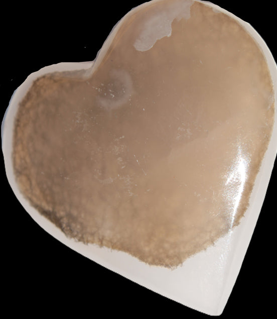 Mangano Calcite hand-carved heart 60-65mm  112-117g in sun light - Rocks and Things Store