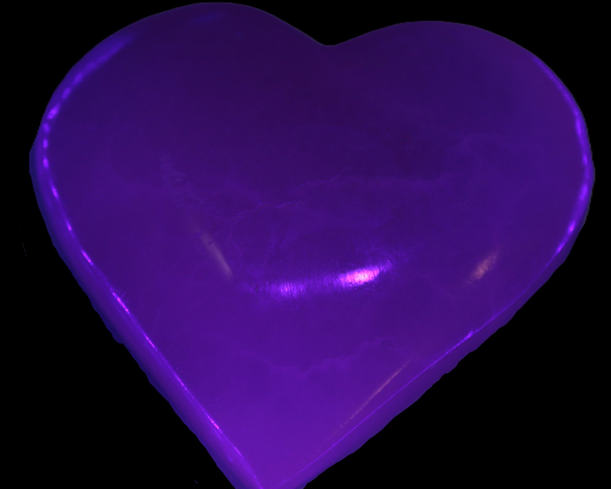Mangano Calcite hand-carved heart 60-65mm  112-117g in UV light -  Rocks and Things Store