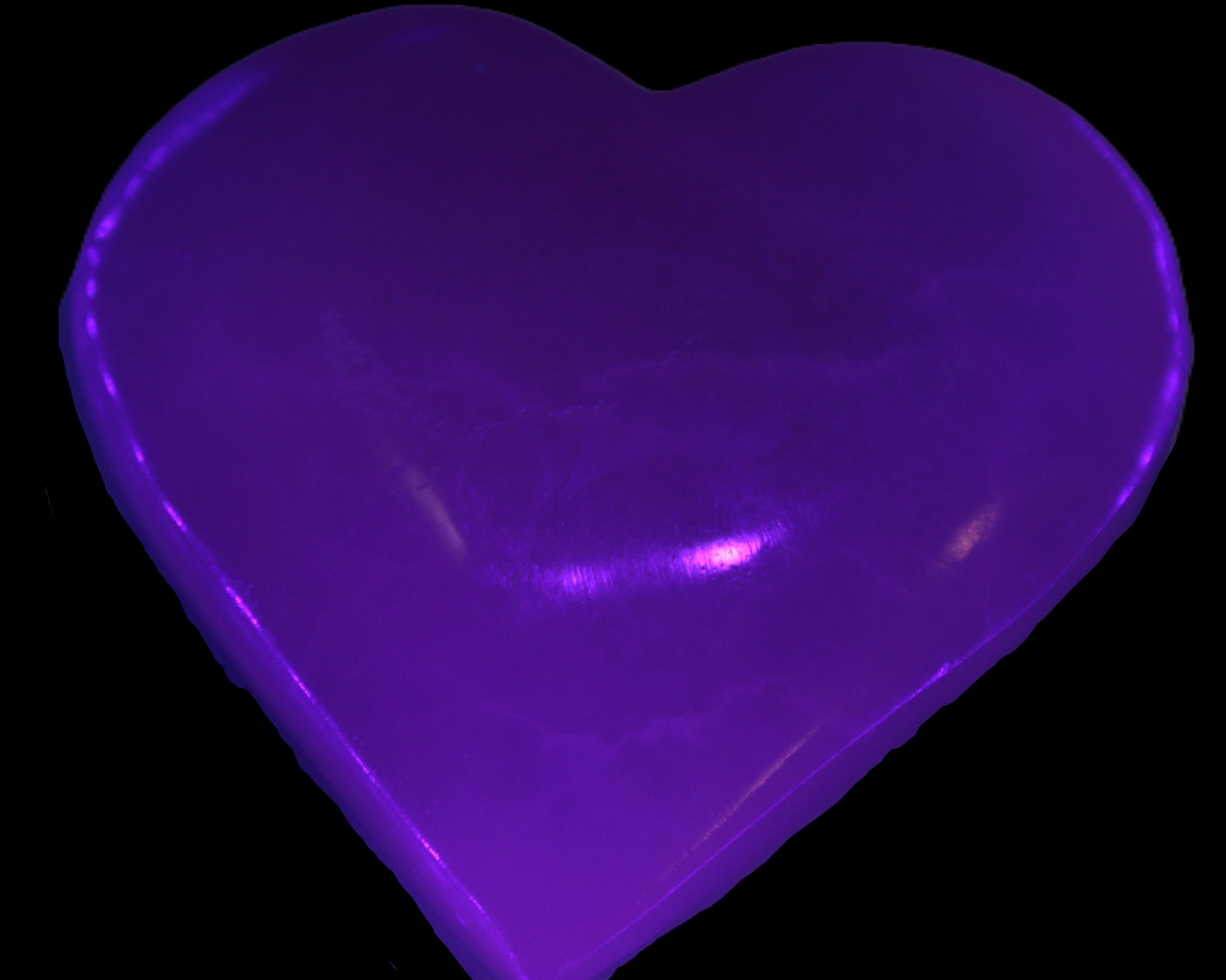 Mangano Calcite hand-carved heart 60-65mm  112-117g in UV light -  Rocks and Things Store