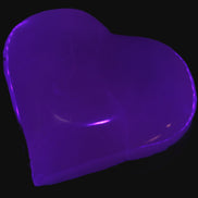 Mangano Calcite hand-carved heart 60-65mm  112-117g in UV light -  Rocks and Things Store