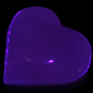 Mangano Calcite hand-carved heart 60-65mm  112-117g in UV light -  Rocks and Things Store