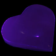 Mangano Calcite hand-carved heart 60-65mm  112-117g in UV light -  Rocks and Things Store  112-117g Rocks and Things