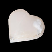 Mangano Calcite hand-carved heart 47-49mm 58-66g in sunlight - Rocks and Things Store