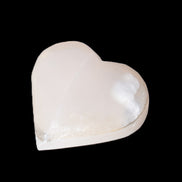 Mangano Calcite hand-carved heart 47-49mm 58-66g in sunlight - Rocks and Things Store