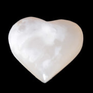 Mangano Calcite hand-carved heart 47-49mm 58-66g in sunlight - Rocks and Things Store