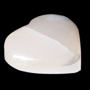 Mangano Calcite hand-carved heart 47-49mm 58-66g in sunlight - Rocks and Things Store