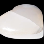 Mangano Calcite hand-carved heart 47-49mm 58-66g in sunlight - Rocks and Things Store