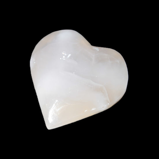 Mangano Calcite hand-carved heart 49*47mm 66g in sunlight - Rocks and Things Store
