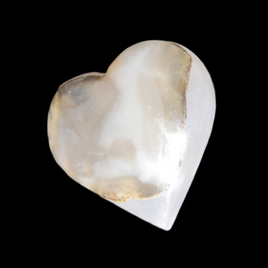 Mangano Calcite hand-carved heart 49*47mm 66g in sunlight - Rocks and Things Store