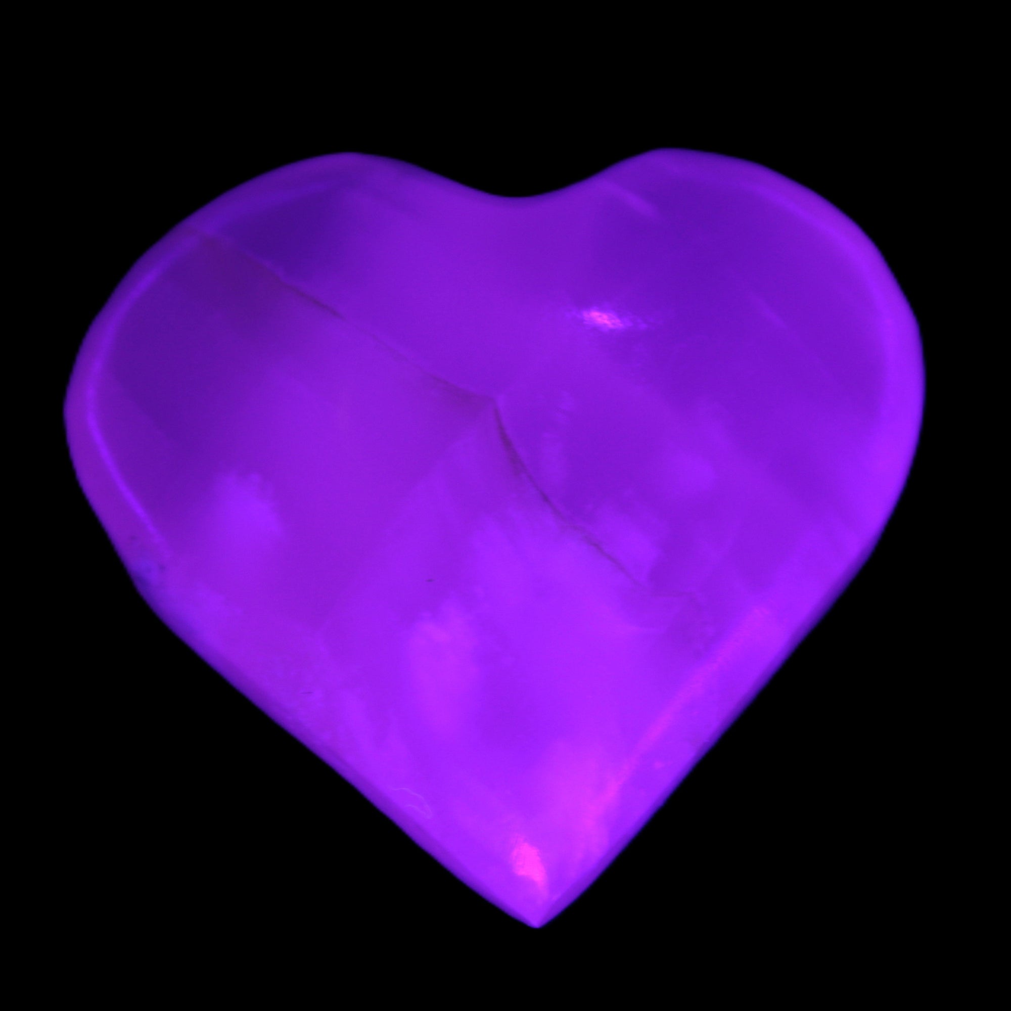 Mangano Calcite heart 38-44mm 36-39g in UV light - Rocks and Things Store