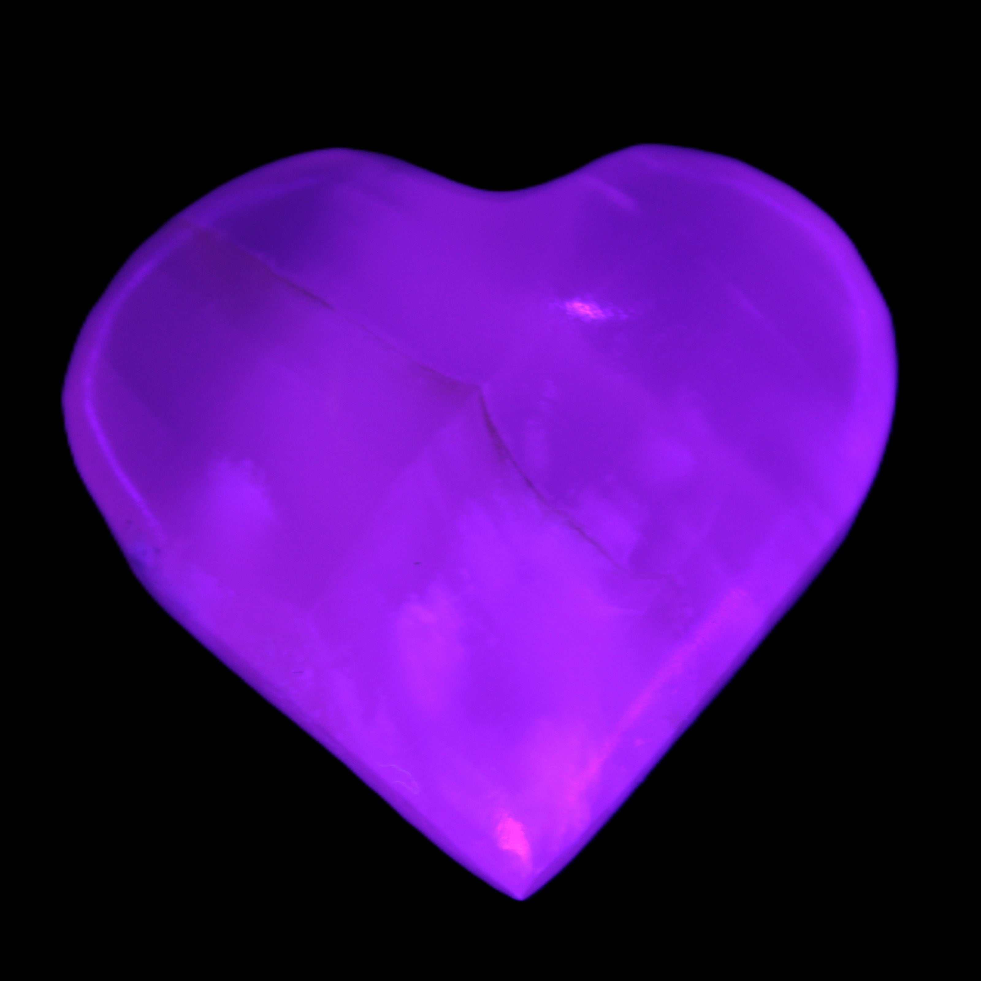 Mangano Calcite heart 38-44mm 36-39g in UV light - Rocks and Things Store