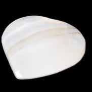 Mangano Calcite heart 38-44mm 36-39g in sunlight - Rocks and Things Store