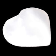 Mangano Calcite heart 38-44mm 36-39g in sunlight - Rocks and Things Store