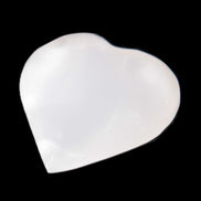 Mangano Calcite heart 38-44mm 36-39g in sunlight - Rocks and Things Store