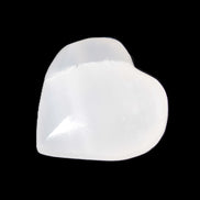 Mangano Calcite heart 38-44mm 36-39g in sunlight - Rocks and Things Store