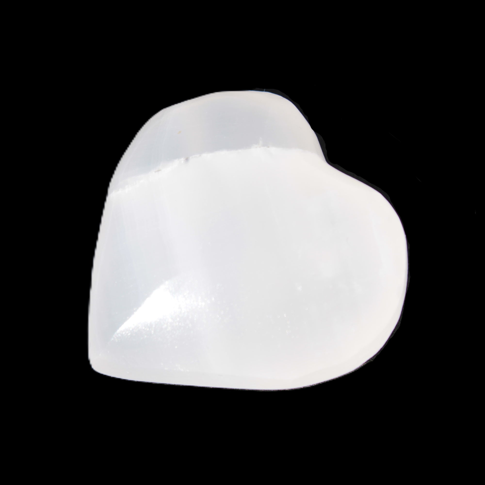 Mangano Calcite heart 38-44mm 36-39g in sunlight - Rocks and Things Store