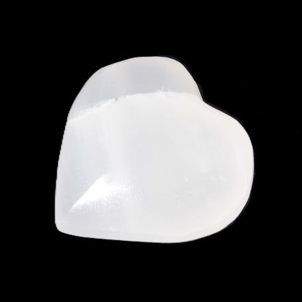 Mangano Calcite heart 38-44mm 36-39g in sunlight - Rocks and Things Store
