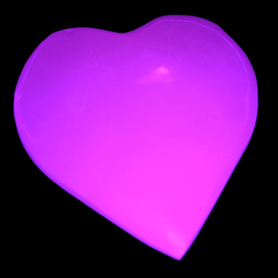 Pink Mangano Calcite heart 41-44mm 44-49g in UV light -  Rocks and Things Store