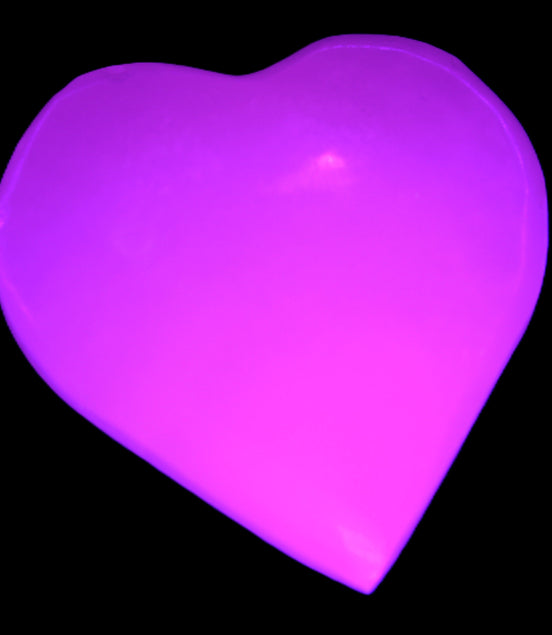 Pink Mangano Calcite heart 41-44mm 44-49g in UV light -  Rocks and Things Store