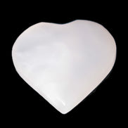 Pink Mangano Calcite heart 41-44mm 44-49g in sunlight - Rocks and Things Store