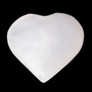 Pink Mangano Calcite heart 41-44mm 44-49g in sunlight - Rocks and Things Store