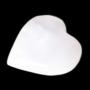 Pink Mangano Calcite heart 41-44mm 44-49g in sunlight - Rocks and Things Store