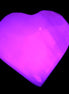 Pink Mangano Calcite heart 38-41mm  42-44g in UV light - Rocks and Things Store