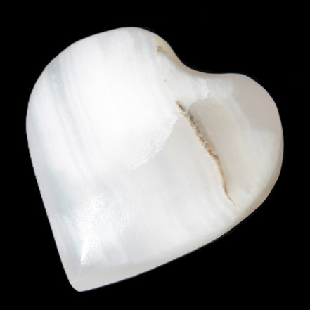 Pink Mangano Calcite heart 38-41mm  42-44g in sunlight - Rocks and Things Store