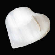 Pink Mangano Calcite heart 38-41mm  42-44g in sunlight - Rocks and Things Store